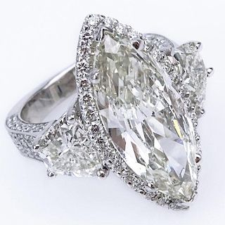 Approx. 10.64 Carat TW Diamond and 14 Karat White Gold Engagement Ring Set in the Center with a 6.64 Carat Marquise Cut Diamo