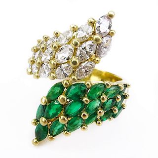 Vintage Approx. 3.0 Carat Oval Cut Emerald, 3.0 Carat Oval Cut Diamond and 18 Karat Yellow Gold Cross Over Ring.