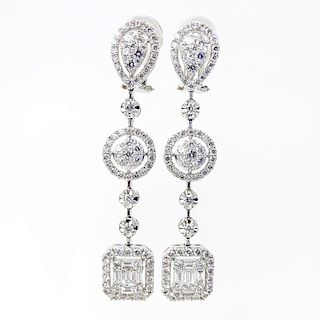 Approx. 4.0 Carat Round Brilliant and Baguette Cut Diamond and 18 Karat White Gold Chandelier Earrings.