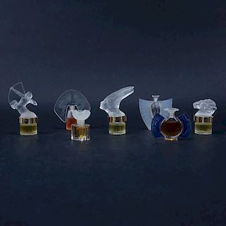 Seven (7) Miniature Lalique Bottles.