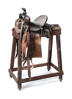 Three Vintage Brown Leather Western Saddles Seat of largest 14 inches.