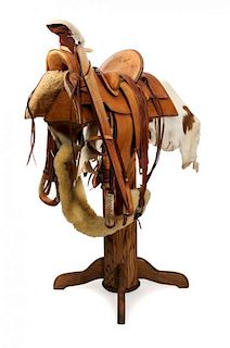 A Custom Tan Leather Western Saddle Set Seat 14 1/4 inches.