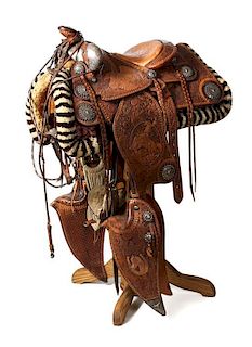 A Silver, Gold and Tooled Brown Leather Western Saddle Set Seat 14 3/4 inches.