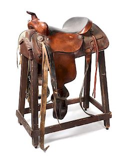 A Brown Leather Dude Saddle Seat 15 1/4 inches.