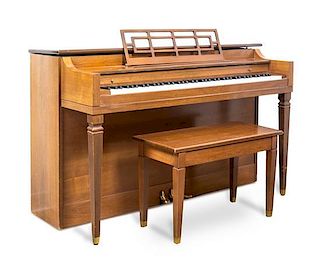 A Grinnell Brothers Upright Piano