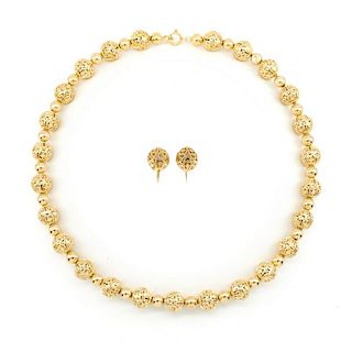 14k Yellow gold filigree bead necklace and earrings.