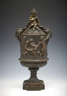 Bronze lidded urn decorated with cupid, cornucopias, 15"h