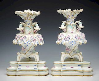 Pair of Jacob Petit elaborate porcelain tripod epergnes
