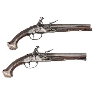 Pair of Early Silver Mounted Queen Ann  Flintlock Pistols
