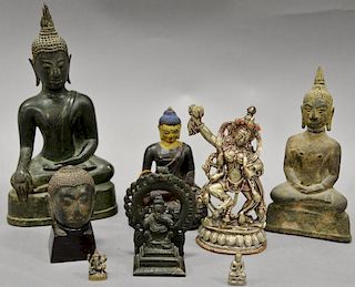 Group of eight Asian and Archaic pieces to include two copper or bronze alloy figures of Buddha along with remnant of an arch