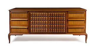 Italian, c.1950, a sideboard with carved wood doors