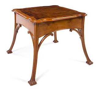 * French, FIRST HALF 20TH CENTURY, an Art Nouveau style mahogany occasional table