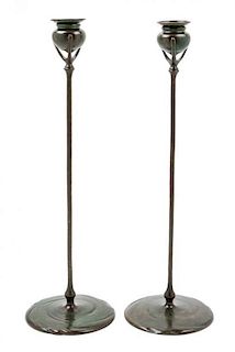 * Tiffany Studios, EARLY 20TH CENTURY, a pair of bronze candlesticks (1213)