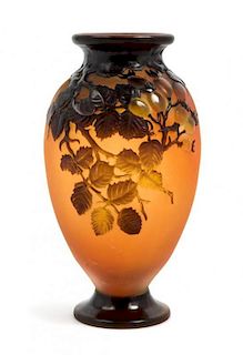 * Emile Galle, (French, 1846-1904), a mold blown cameo glass vase, with wild rose decoration