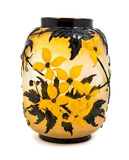 * Emile Galle, (French, 1846-1904), a mold blown cameo glass vase, with clematis decoration