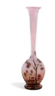 * Daum, EARLY 20TH CENTURY, a miniature enameled cameo glass cabinet vase, of bottle form with landscape decoration