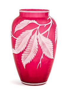 * English, LATE 19TH CENTURY, a cameo glass vase, of elongated ovoid form with berry laden leafy branch decoration