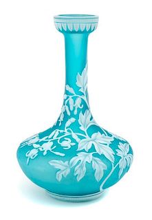 * English, LATE 19TH CENTURY, a cameo glass vase, of bottle form with flared, decorated mouth, the body with bleeding heart f