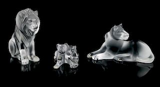* Lalique, a molded and frosted glass figural group, comprising a lioness, lion, and lion cubs
