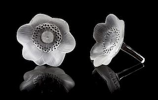 * Lalique, a pair of molded and frosted glass Anemone figural paperweights