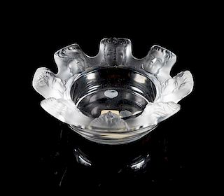 * Lalique, a Saint Nicholas pattern molded and frosted glass ash receiver