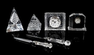 * Waterford, a group of six crystal table articles, comprising two clocks, two paperweights and two letter openers