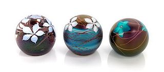 * Richard Golding, STATION GLASS CO., LEICESTERSHIRE, ENGLAND, 1986-1987, a group of three glass paperweights