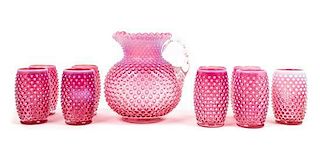 A Cranberry Hobnail Glass Drinks Set Height of pitcher 8 inches.