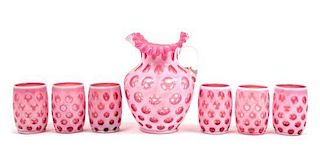 A Cranberry Coin Dot Drink Set Height of pitcher 8 1/2 inches.