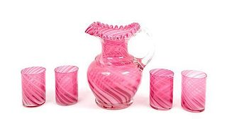 A Cranberry Glass Swirl Decorated Drink Set Height of pitcher 9 1/4 inches.