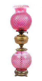 A Cranberry Hobnail Glass Fluid Lamp Height overall 26 1/2 inches