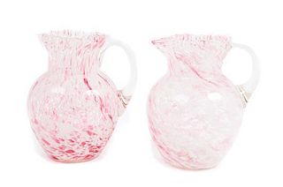 A Near Pair of Speckled Glass Pitchers Height 8 1/2 inches