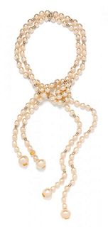 A Chanel Large Faux Pearl Lariat Necklace, 37" x 1".