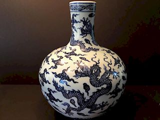 A Fine Chinese Blue and White Dragon Vase, Ming YongLe mark. 16 3/4" high, 13" wide.