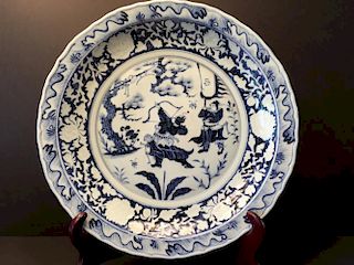 A Fine Chinese Blue and White Charger with fighting soldiers. 17 3/4" dia. 17 1/2" dia.