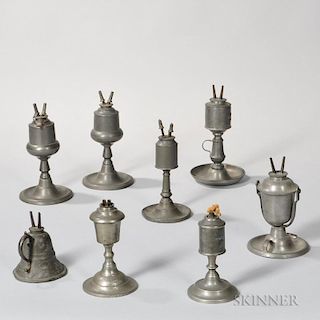 Eight Pewter Oil Lamps