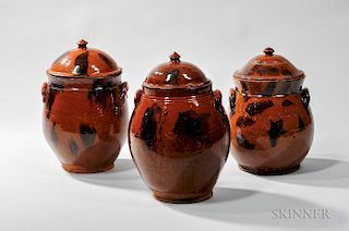 Three Manganese-decorated New England Covered Redware Jars