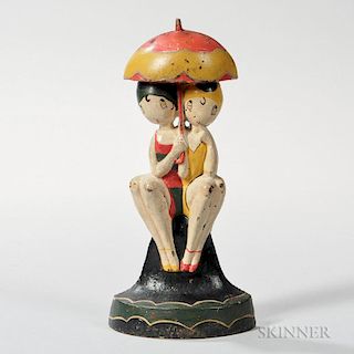 Cast Iron and Paint-decorated Hubley Bathing Beauties Doorstop