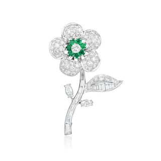 A Diamond and Emerald Flower Brooch