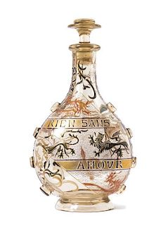 * An Emile Galle Enameled and Applied Glass Decanter, Height 10 1/2 inches.