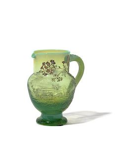 * An Emile Galle Enameled Cameo Opalescent Glass Pitcher, Height 5 1/2 inches.