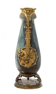 * A French Art Nouveau Pottery and Gilt Bronze Mounted Vase, Height overall 12 1/4 inches.