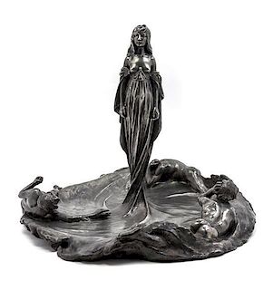 * A French Art Nouveau Pewter Figural Centerpiece, Height 16 1/4 x diameter 20 1/4 inches.