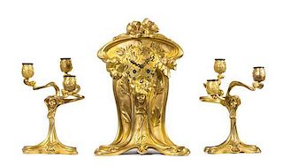 * A French Art Nouveau Gilt Bronze Three-Piece Clock Garniture, Height of clock 15 inches.