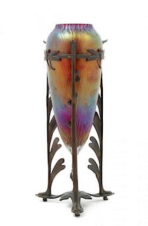 * An Art Nouveau Style Iridescent Glass and Cast Metal Mounted Vase, Height overall 15 inches.