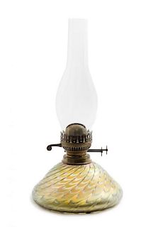 * An Austrian Iridescent Glass Fluid Lamp, Diameter 7 3/4 inches.