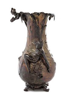 * An Art Nouveau Silvered Cast Metal Vase, Height 22 3/4 inches.