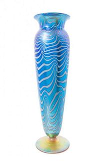* A Durand Iridescent Blue Glass Vase, Height 13 7/8 inches.