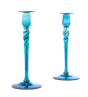 * A Pair of Steuben Blue Aurene Glass Candlesticks, Height 12 1/8 inches.