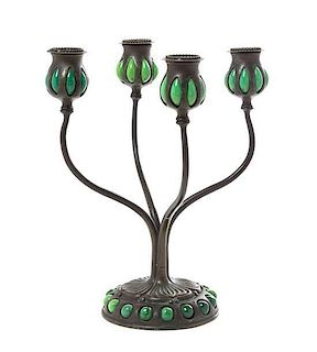 * A Tiffany Studios Blown Out Glass Four-Light Candelabra, Height 12 inches.